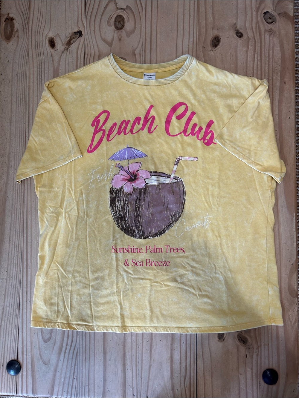 No Boundaries Women’s Yellow 'Beach Club' Graphic Tee with Pink Accents